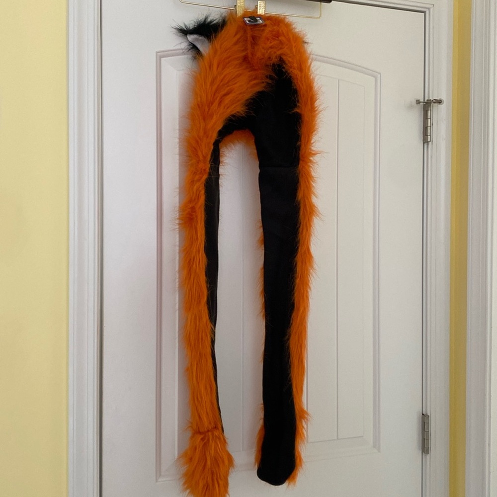 Fun animal hat with built in mittens.